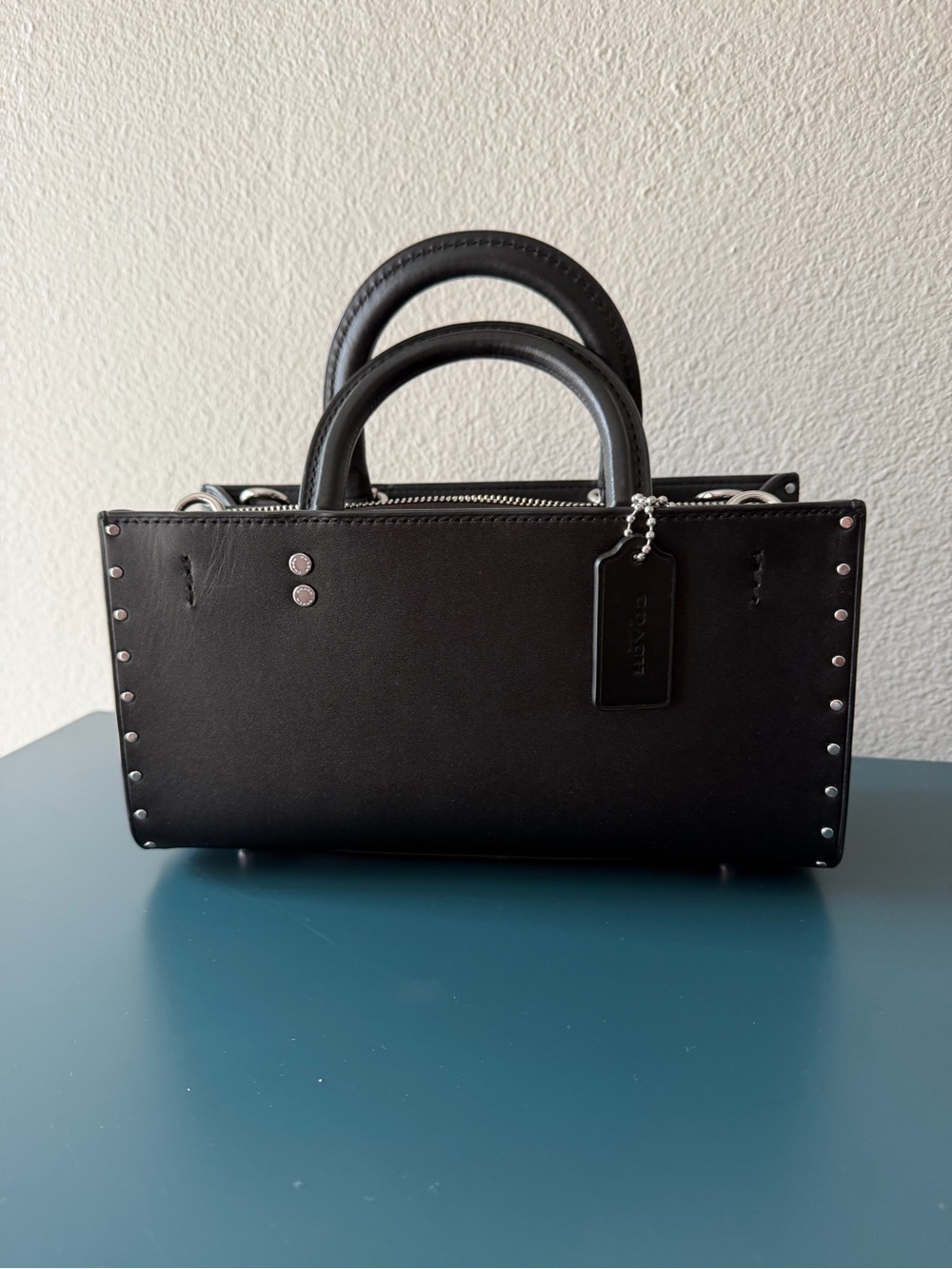 Coach Rogue 26 with Rivets